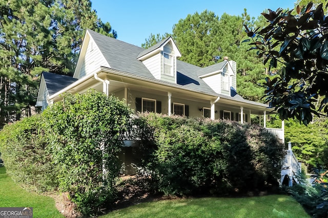 exterior space featuring a lawn