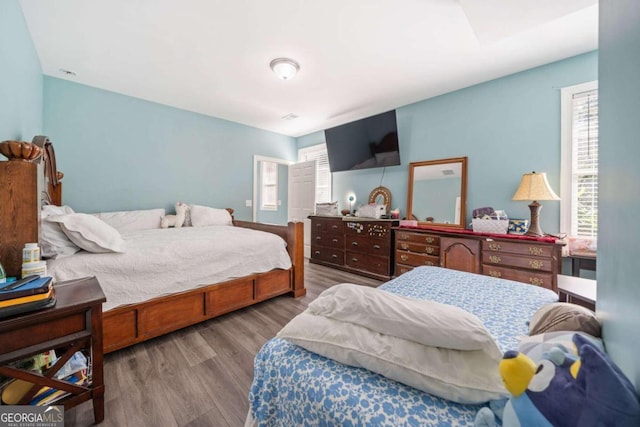 bedroom featuring hardwood / wood-style floors