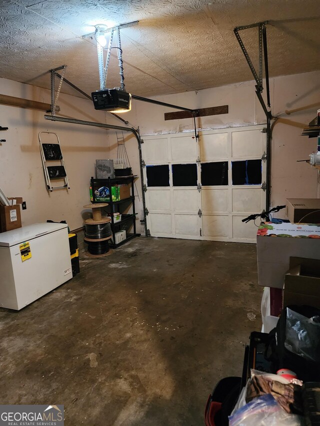 interior space featuring ceiling fan and a textured ceiling