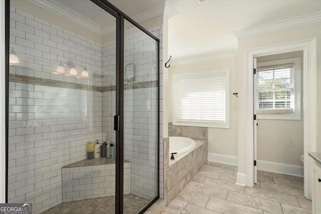 bathroom featuring vanity, ornamental molding, and shower with separate bathtub