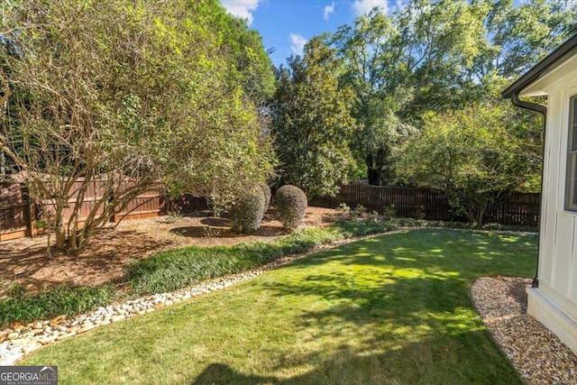 view of yard featuring a fenced backyard