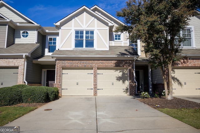 townhome / multi-family property featuring a garage