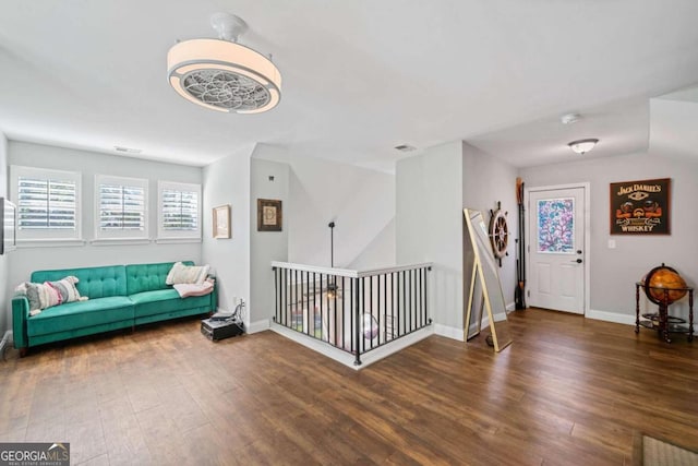 foyer entrance with dark hardwood / wood-style flooring