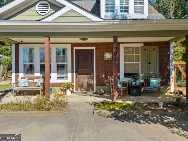 view of front of home featuring covered porch