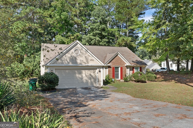 view of front facade featuring a garage and a front yard