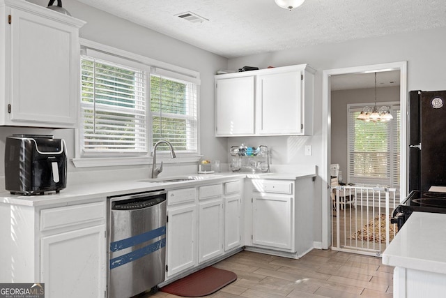 kitchen featuring stainless steel dishwasher, a notable chandelier, white cabinets, and sink