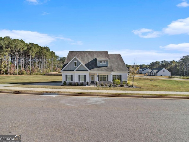 view of front of property with a front lawn