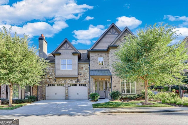 view of front of property featuring a garage