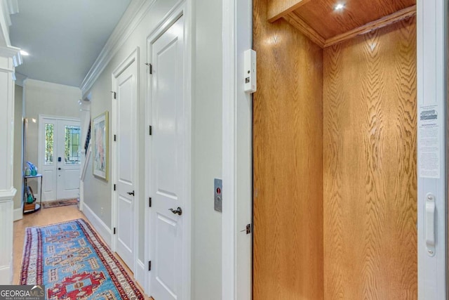 corridor with wood walls, french doors, wood ceiling, hardwood / wood-style floors, and elevator