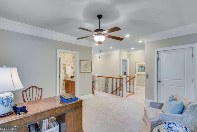 office space featuring light carpet, ornamental molding, and ceiling fan