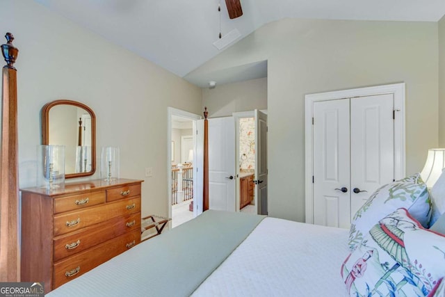 bedroom with lofted ceiling, a closet, and ceiling fan