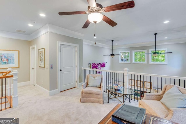 living area with light carpet, ornamental molding, and ceiling fan