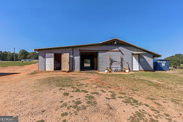 exterior space featuring an outbuilding