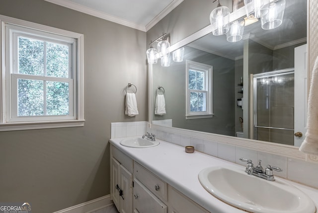 bathroom featuring vanity, tasteful backsplash, ornamental molding, and an enclosed shower