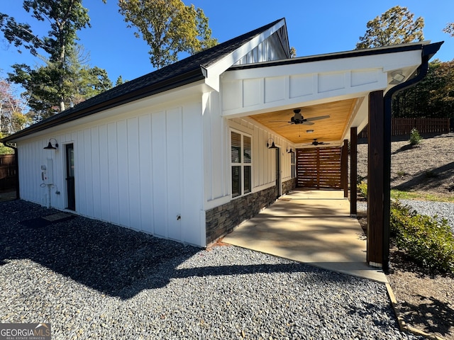 view of home's exterior featuring ceiling fan