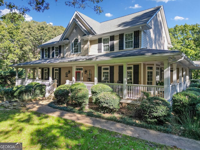 farmhouse-style home featuring a porch