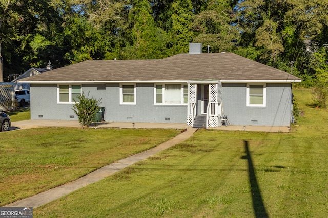 ranch-style house featuring a front lawn