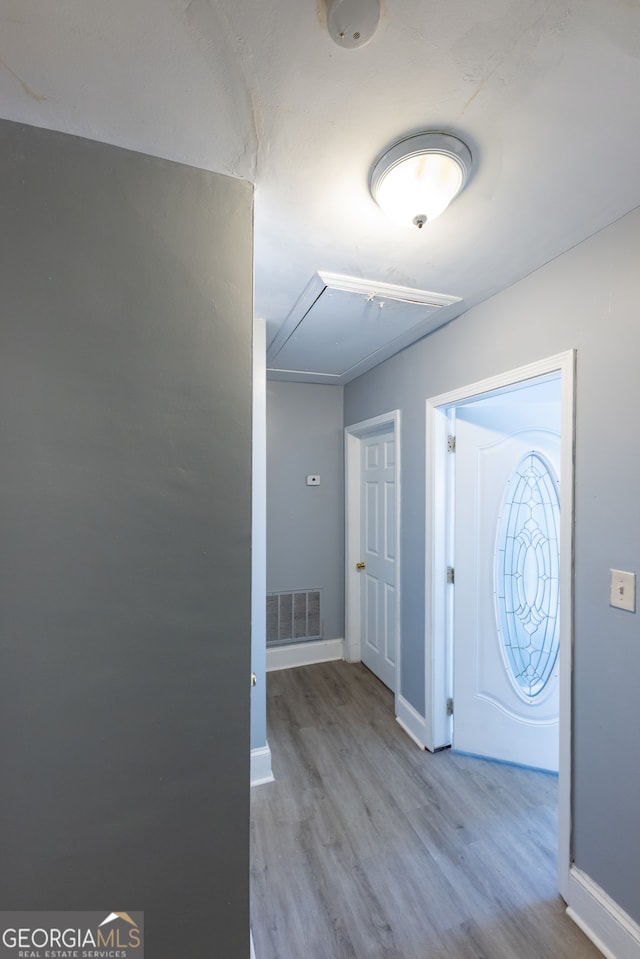 entrance foyer with light hardwood / wood-style flooring