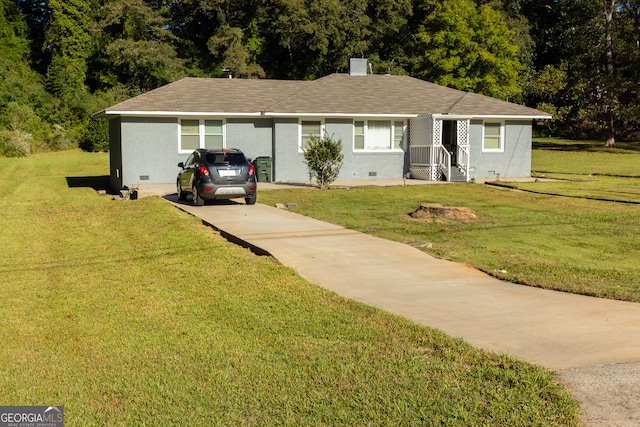 single story home featuring a front lawn