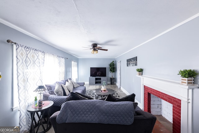 living room with a brick fireplace, ornamental molding, wood-type flooring, and ceiling fan