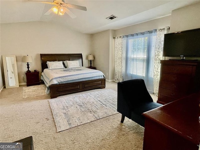 carpeted bedroom with lofted ceiling and ceiling fan