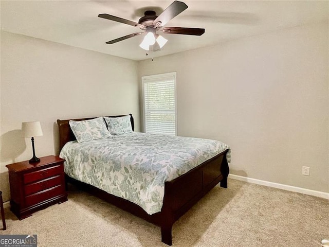 bedroom with light carpet and ceiling fan