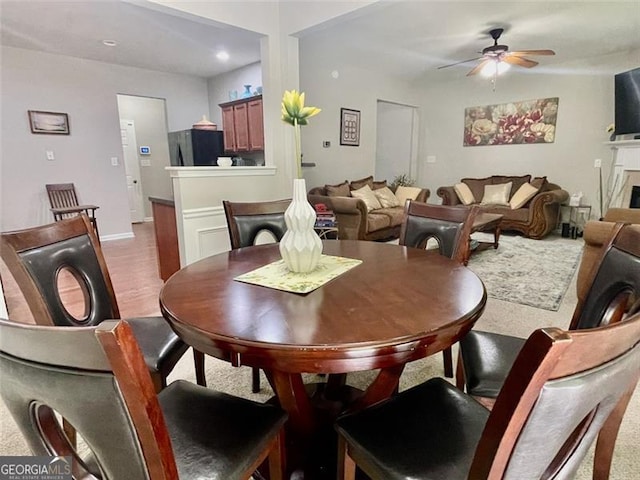 dining area with ceiling fan