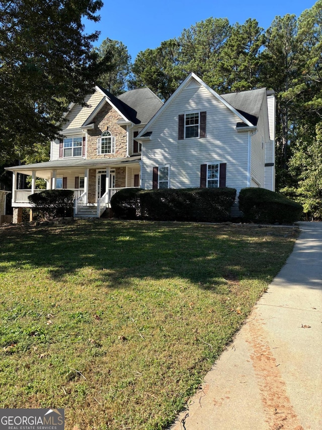 view of front of home featuring a front yard