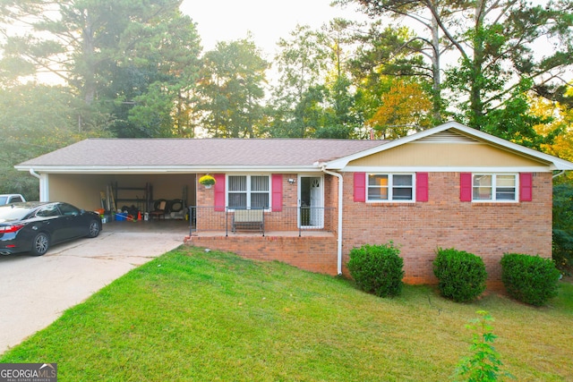 ranch-style house with a front lawn and a carport