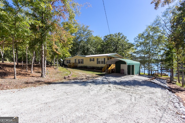 view of front of house featuring a carport