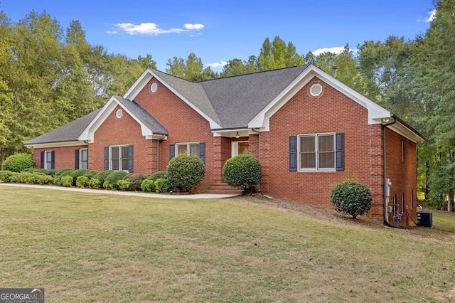 view of front facade featuring central AC and a front lawn