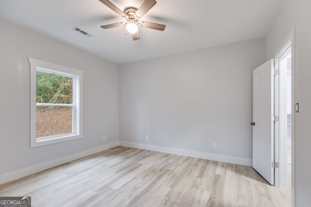 unfurnished room featuring ceiling fan and light hardwood / wood-style flooring