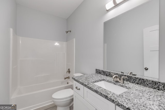 full bathroom with toilet, vanity, and washtub / shower combination