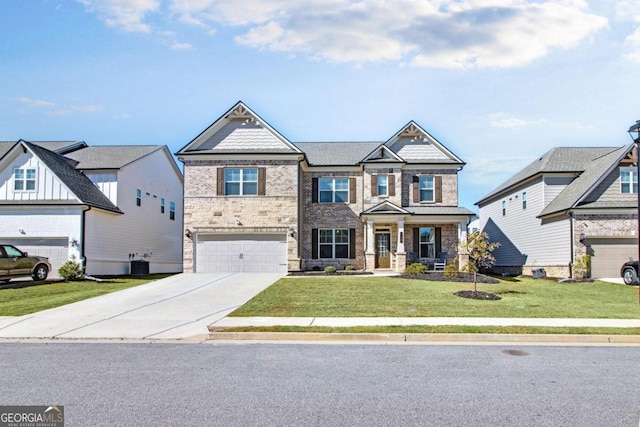 view of front facade with central AC, a front yard, and a garage