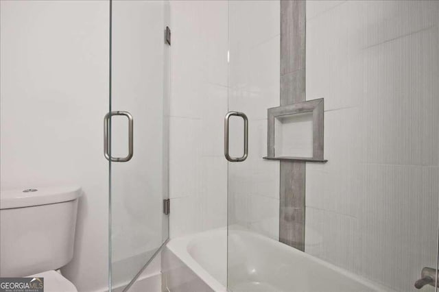 bathroom with toilet and plus walk in shower