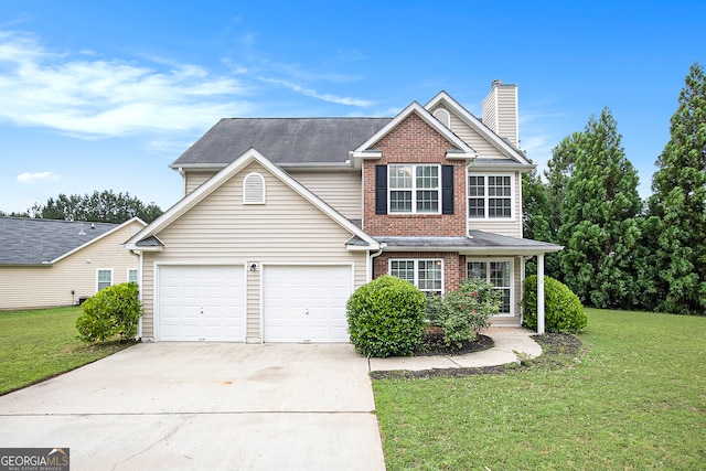 view of front of house featuring a garage and a front lawn