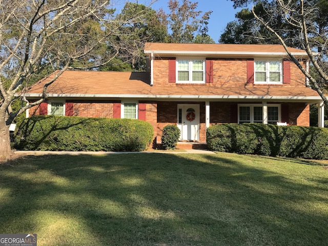 view of front property featuring a front lawn