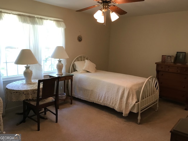 bedroom featuring carpet flooring and ceiling fan