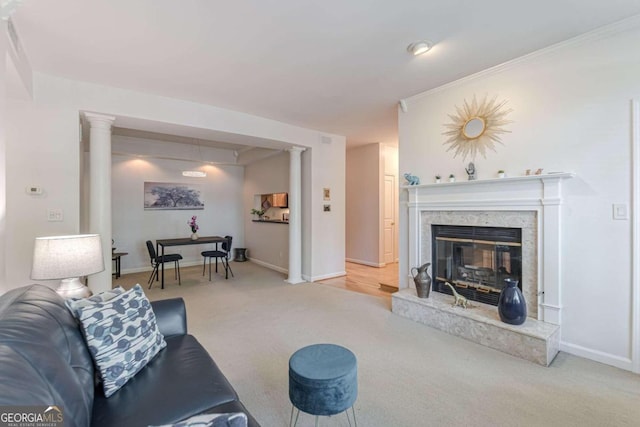 living room featuring crown molding and carpet floors