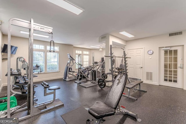 workout area with ceiling fan