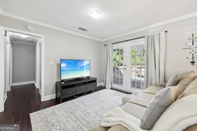 living room featuring french doors, crown molding, and dark hardwood / wood-style floors