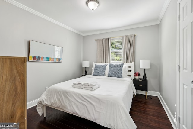 bedroom with dark wood-type flooring and crown molding