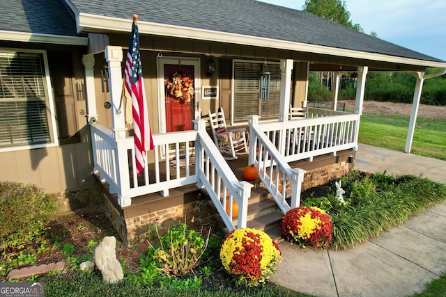 doorway to property with covered porch