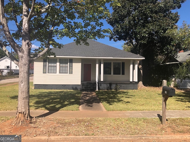 view of front of home with a front yard