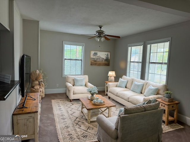 living room with crown molding and ceiling fan