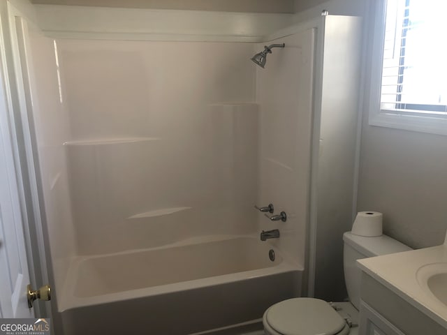 full bathroom featuring vanity, shower / bathing tub combination, and toilet