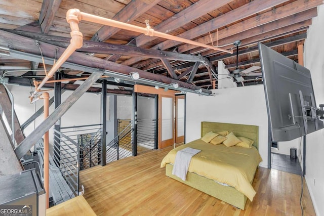 interior space featuring wood ceiling, beam ceiling, and hardwood / wood-style floors