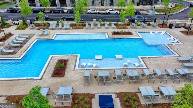 pool featuring a patio area