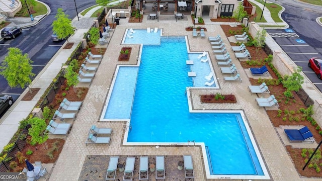 view of swimming pool featuring a patio area