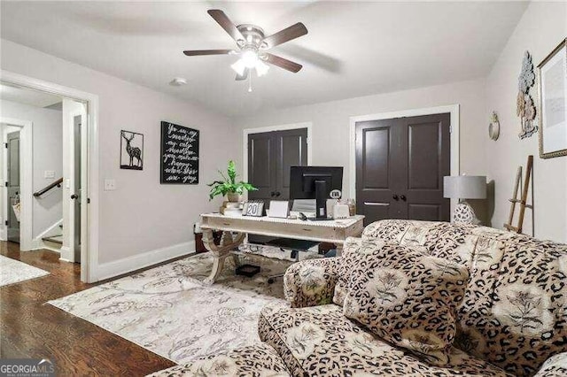 office area with ceiling fan and hardwood / wood-style floors